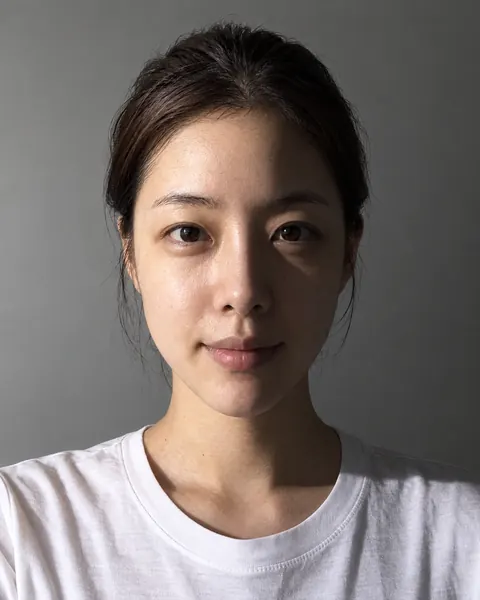 The same selfie with one side of the face in shadow